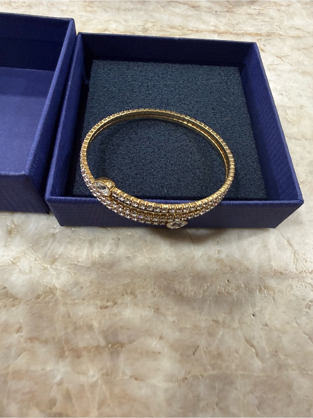Swarovski gold-tone Twisty Drop double-wrap bangle